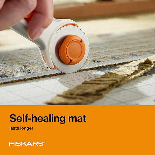 Fiskars Cutting Mat, Self-Healing Fabric Cutting Surface, Double-Sided Grid with Bias Lines, 18"x24"